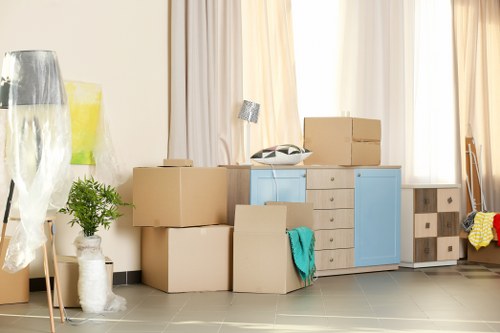 Office removal team planning a move in Belsizepark street setting