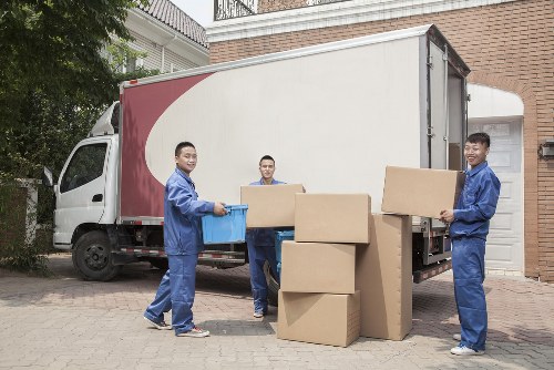 Removal team planning a house move in Belsize Park residential street