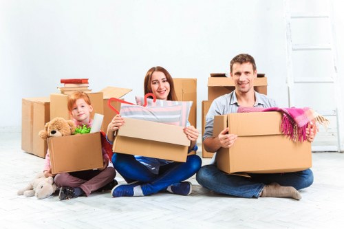Removal team using safe lifting and planning during a house move