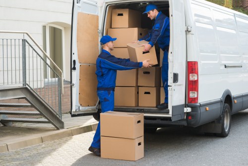 Household items being unloaded into a new home near Belsize Park