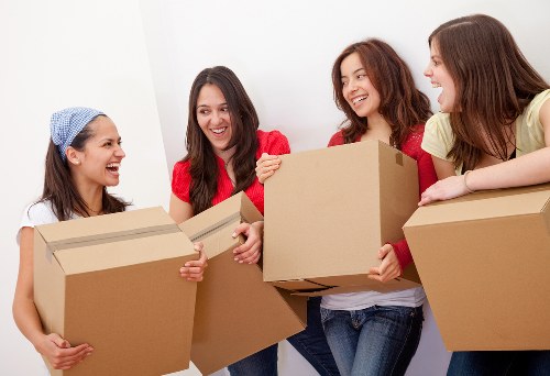 Careful wrapping of fragile household items during a local move