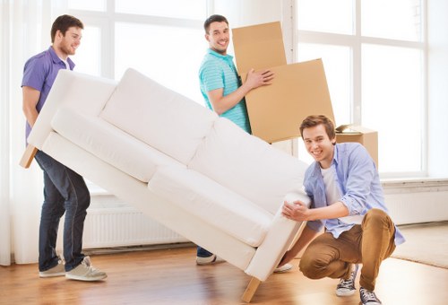 Packed boxes and furniture prepared for a flat removal in Belsize Park