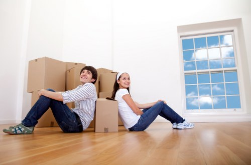 Careful transport of boxes and household items in a local moving van