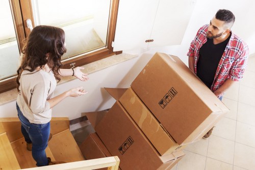 Packed office boxes and equipment ready for relocation