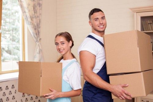 Local movers loading household items for a Belsizepark property move