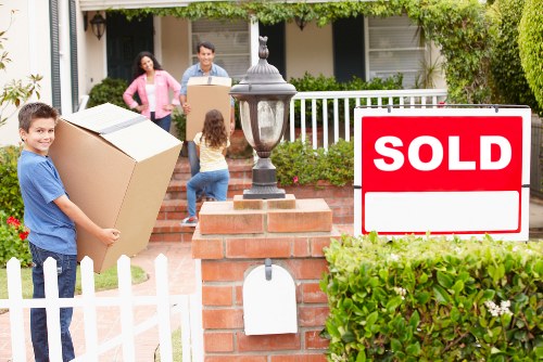 Professional movers handling a staircase move in Belsizepark