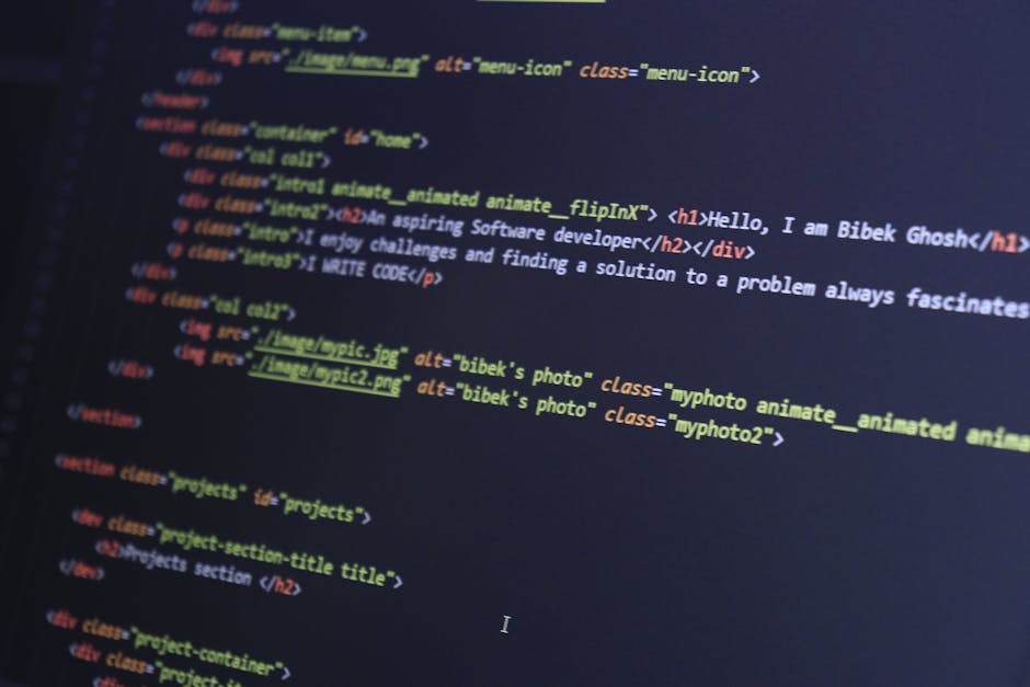 A computer screen displaying lines of code written in HTML, including tags such as <html>, <head>, <title>, and <meta>. The code is highlighted with syntax coloring in shades of blue, red, and orange 